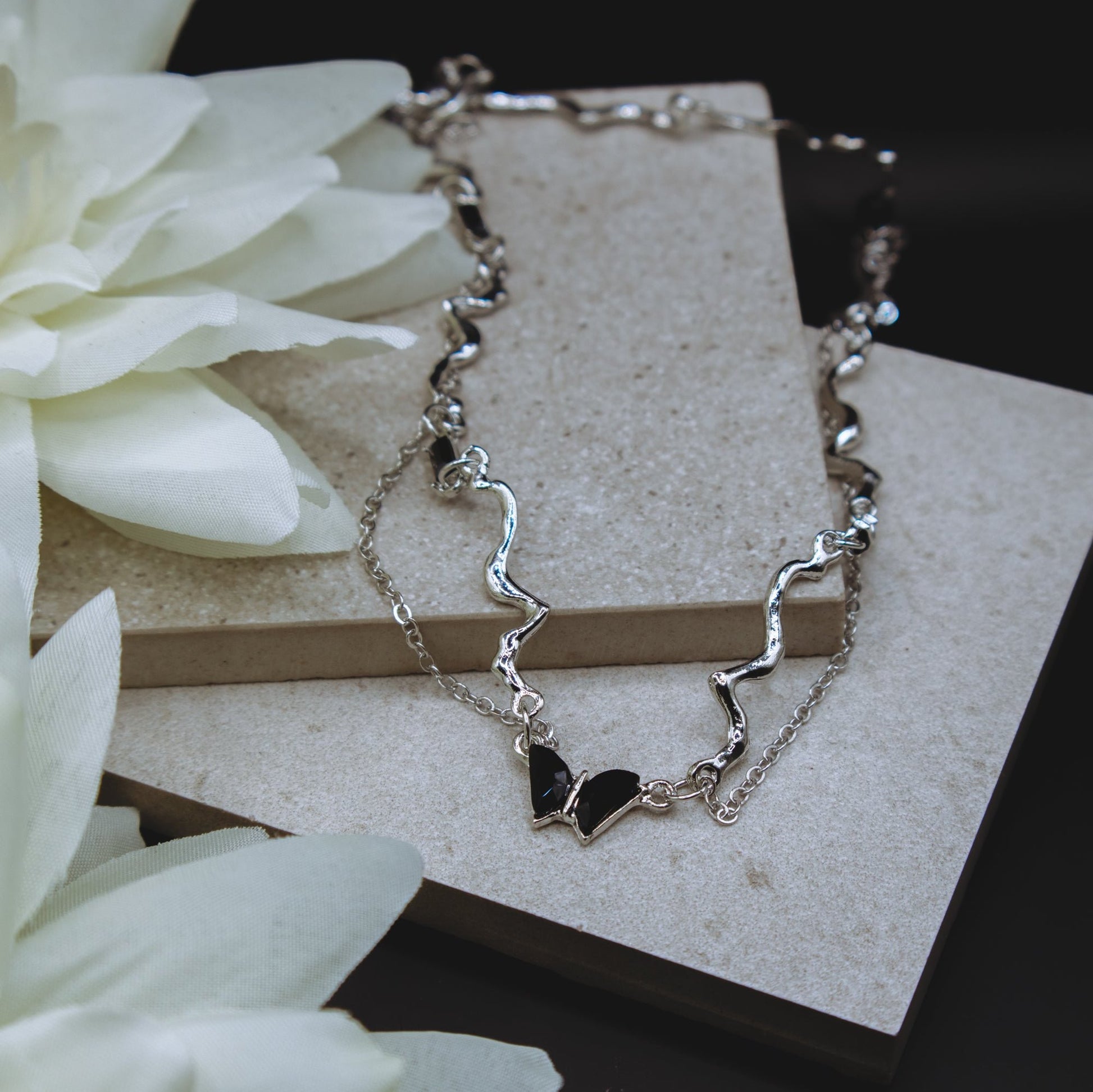 Edgy black butterfly layered necklace