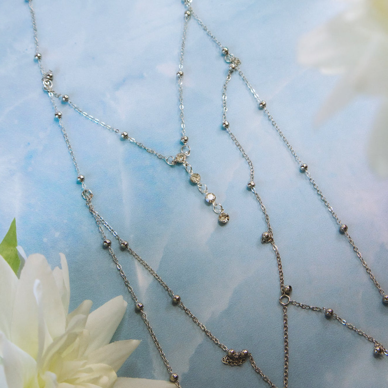 body chain on blue background